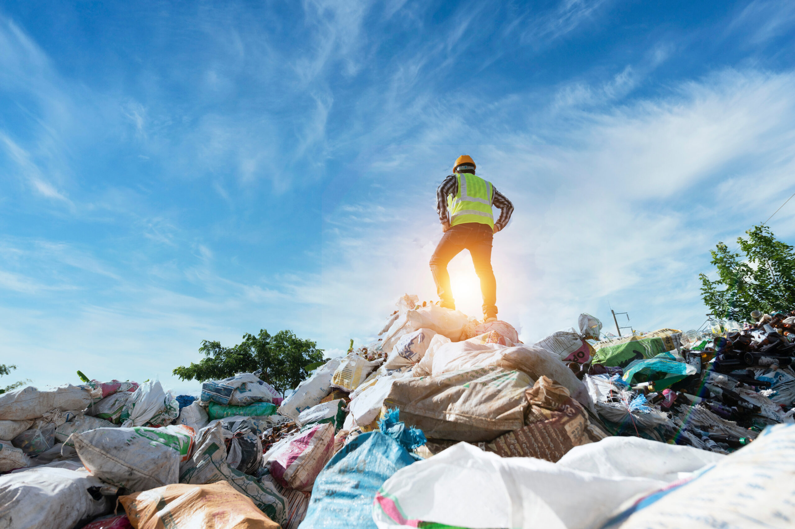 ecological engineering standing on the mountain rubbish big pile of garbage degraded waste A pile of bad smells and toxic residues